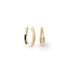 The Annamaria Cammilli Two Diamond Huggie Hoop Dune Earrings in 18K gold offer a sleek, modern design inspired by desert forms. Set with 0.32 ct of white diamonds, these hoops provide a subtle yet striking sparkle, blending contemporary style with understated refinement.• 0.32CT White Diamond• Available in 18K Gold Colors :• Yellow Sunrise• Orange Apricot • White Ice • Pink Champagne • Natural Beige Yellow Gold Earrings With Timeless Design, Elegant White Gold Diamond Earrings With Tension Setting, Elegant Yellow Gold Diamond Earrings With Single Cut Diamonds, Elegant White Gold Earrings With Tension Setting, Everyday Luxury Yellow Gold Earrings With Timeless Design, Elegant Wedding Diamond Earrings With Tension Setting, Elegant Formal Huggie Earrings With Single Diamond, Elegant Diamond Earrings For Anniversary With Tension Setting, Modern Yellow Gold Earrings With Brilliant Cut