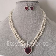 Jewelry: shell pearl; red zirconia  Color: white, red Grade: A have natural blemish and growth rings on pearl's surface Size: 6mm Length: Necklace offer 15-25 inch; if you need other length, please feel free to contact me! Handwork: knotted between every 2 pearl bead Metal: alloy Shipping: I will send out your order in 1-5 business days. Usually will take about 7-25 business days.  Good luck! Bridesmaid Jewelry Set, Pendant Earrings Set, Pearl Necklace Wedding, Pearl Necklace Earrings, Pearl Jewelry Sets, Pearl Jewelry Necklace, White Sea, Bridesmaid Jewelry Sets, Gold Pearl Necklace