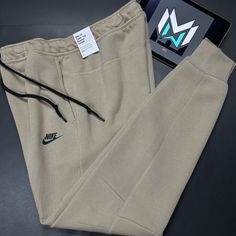 Nike Sportswear Tech Fleece Joggers Tan Men’s Sizes Fb8002-247 Measurements Medium Waist: 31 In Inseam: 29.5 In Length: 41.5 In Large Waist: 35 In Inseam: 29 In Length: 40.5 In Xl Waist: 36 In Inseam: 28 In Length: 42 In 2xl Waist: 40 In Inseam: 29.5 In Length: 43 In 3xl Waist: 42 In Inseam: 30.5 In Length: 43 In 4xl Waist: 45 In Inseam: 29.5 In Length: 43 In Tan Men, Nike Sportswear Tech Fleece, Pants Nike, Tan Guys, Tech Fleece, Fleece Joggers, Nike Sportswear, Mens Clothing Styles, Nike Men