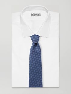 Charvet is widely considered the world's first shirt shop, so a stellar selection of accompanying accessories was a natural progression. The perfect finishing touch, this silk-jacquard tie is detailed with a recurring circular pattern. Luxury Silk Ties, Silk Mark Certified Ties For Business, Luxury Silk Mark Certified Ties For Business, Elegant Silk Mark Certified Formal Ties, Luxury Silk Mark Certified Business Ties, Elegant Formal Silk Mark Certified Ties, Luxury Silk Ties For Semi-formal Occasions, Elegant Silk Mark Certified Suit And Tie Accessories, Luxury Silk Neckwear For Formal Occasions