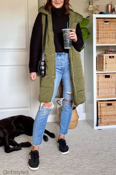 If you love the long puffer vest fashion trend then check out an idea for casual winter outfits with this amazing vest fashion outfits! The perfect cold weather outfit for women 2023. Long Green Vest Outfit, Green Winter Vest Outfit, Fall Vest Outfits Women 2023, How To Style Long Puffer Vest, How To Dress Up A Puffer Vest, Green Vest Outfit Winter, Long Vest Outfits For Women Casual, Long Puffy Vest Outfits For Women, Long Quilted Vest