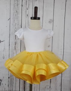 Yellow Tulle Tutu Skirt - numonet Yellow Summer Party Tutu Dress, Stretch Tulle Tutu Dress With Ruffles, Princess Tulle Skirt With Ruffles, Summer Princess Style Fitted Skirt, Princess Style Tulle Skirt With Ruffles, Elegant Yellow Tutu Dress For Wedding, Elegant Yellow Tulle Tutu Dress, Yellow Fitted Tutu Dress For Party, Fitted Yellow Tutu Dress For Party