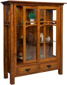 a wooden china cabinet with glass doors and drawers