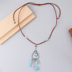 Product Name: Women's Western Turquoise Pendant Leather Necklace Vintage Ethnic Necklace Item NO.: 21554461 Weight: 0.05 kg = 0.1102 lb = 1.7637 oz Category: Accessories> Jewelry Tag: NECKLACE Creation Time: 2023-03-13 Necklace Material:suede + Faux Turquoise,Epoxy.Nickel-free, Lead-free, Cadmium Free and Hypoallergenic Winter Necklace, Western Turquoise, Turquoise Pendant Necklace, Ethnic Necklaces, Boho Style Jewelry, Stone Beaded Necklace, Jewelry Tags, Necklace Vintage, Turquoise Pendant