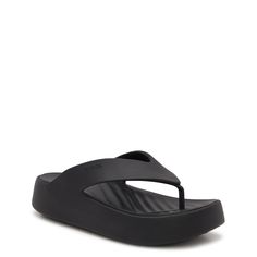 Enjoy the incredible style and comfort offered by these women's Crocs Getaway black platform flip flops. Lightweight, soft, seamless, and flexible, these sandals have Free Feel Technology upper that allows you to move freely without restriction and Drop-in Croslite for ultimate comfort. | Crocs Women's Getaway Platform Flip-Flop Sandal in Black Size 10 Medium Croc Flip Flops, Beach Slides With Thick Synthetic Sole, Beach Slides With Thick Synthetic Bottom, Synthetic Beach Slides With Thick Bottom, Synthetic Platform Slippers For Beach, Comfortable Black Platform Slippers For Beach, Trendy Beach Wedge Sandals With Arch Support, Black Beach Platform Slippers, Black Sandals With Thick Eva Bottom