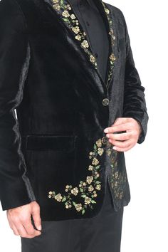 Luxurious Black velvet hand embroidered with a detailing craftsmanship , blazer based fabric  is velvet  , Same velvet  used as base for embroidery designed with notch lapel , two side vents and two front button for closure , but you can customised this pc with your choice in other pattern  , like you can get top Notch lapel , or single button closure or double breasted or anything which you like to change . You can get in multiple colours for the same, Perfect for any occasion be it Wedding, Pa Fall Bandhgala With Intricate Embroidery, Designer Blazer With Gold Embroidery For Formal Occasions, Elegant Embroidered Bandhgala For Fall, Traditional Fitted Embroidered Blazer, Fitted Embroidered Festive Blazer, Festive Fitted Blazer With Intricate Embroidery, Festive Fitted Embroidered Blazer, Designer Long Sleeve Blazer With Resham Embroidery, Elegant Party Blazer With Floral Embroidery