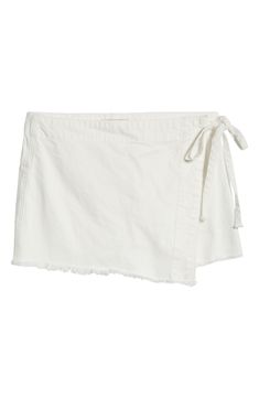 Show off your stems in this clean-white skort designed with a wrapped-and-tied front. 13" length; 2 1/2" inseam; 24" leg opening (size 2) 100% cotton Dry clean or machine wash, tumble dry Imported Chic Cotton Skort With Built-in Shorts, Summer Cotton Mini Skort, Cotton Mini Skort For Summer, Summer Cotton Skort With Built-in Shorts, Spring Cotton Skort In Short Length, Spring Cotton Skort With Frayed Hem, Spring Cotton Short-length Skort, Spring Cotton Short Length Skort, Cotton Cutoff Skort With Frayed Hem