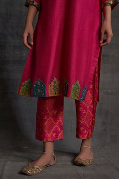 Pink raw silk kurta with floral, resham, thread and sequins applique embroidery. Comes with khufal printed pant and a dupatta.
Components: 2
Pattern: Printed, Embroidered
Type Of Work: Khufal, Floral, Resham, Thread, Sequins
Neckline: V Neck
Sleeve Type: Three quarter
Fabric: Raw silk
Color: Pink
Other Details: 
Attached lining
Length:
Kurta: 42 inches
Pant: 37 inches
Model Height: 5ft 5inches, wearing size M
Occasion: Sangeet - Aza Fashions Embroidered Slub Silk Palazzo Set, Diwali Embroidered Tussar Silk Palazzo Set, Embroidered Silk Palazzo Set For Navratri, Tussar Silk Sets With Intricate Embroidery For Navratri, Silk Bottoms For Festive Occasions, Embroidered Slub Silk Palazzo Set With Traditional Drape, Traditional Silk Palazzo Set With Multicolor Embroidery, Silk Pants With Zari Work For Eid, Silk Pants With Chikankari Embroidery For Festive Occasions