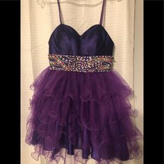 This Is A Beautiful Swarovski Pink And Rhinestone Banded Purple Homecoming Dress. It Was Worn 1 Time Only For A Banquet. It Is A Size 6 With A Built In Bra With Sewn In Straps But Was Bought A Strapless Dress. Purple Homecoming, Purple Homecoming Dress, Homecoming Dress, Homecoming Dresses, Color Purple, Homecoming, Strapless Dress, Colorful Dresses, Built In