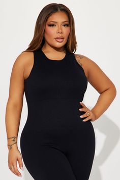 Available In Black, Charcoal, And Sand. Active Jumpsuit Seamless Ribbed Crew Neck Sleeveless Back Cut Out Skinny Leg Stretch 92% Nylon 8% Elastane Imported | Effortless Kim Ribbed Seamless Jumpsuit in Black size Large by Fashion Nova Seamless Jumpsuit, Leg Stretching, Black Jumpsuit, Black Charcoal, Fashion Nova, Black Fashion, Cut Out, Jumpsuit, Size Medium