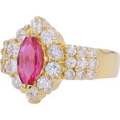 Imagine the moment when you slip this ring onto your finger—a masterpiece of luxury and passion. The marquise-cut ruby, fiery and bold at 0.55 carats, rests like a radiant queen amidst a court of sparkling diamonds, each catching the light with an irresistible brilliance. Surrounding the center ruby are 1.25 carats of round-cut diamonds, each one accentuating the allure of the vivid ruby, while the setting itself is crafted from the finest 18K yellow gold. This luxurious gold band, rich and warm Luxury Marquise Ruby Ring With Diamonds, Marquise Red Diamond Ring, Luxury Marquise Red Ruby Ring, Luxury Red Marquise Ruby Ring, Luxury Marquise Cut Red Ruby Ring, Luxury Red Marquise Cut Ruby Ring, Marquise Ruby Ring With Diamonds, Formal Red Marquise Cut Cluster Ring, Marquise Ruby Cluster Ring In Fine Jewelry Style