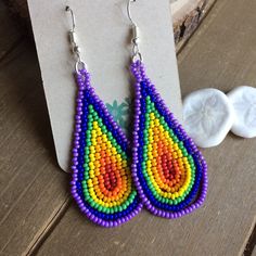 Bohemian Teardrop Beaded Earrings With Colorful Beads, Bohemian Teardrop Earrings With Ear Wire, Unique Teardrop Jewelry With Colorful Beads, Unique Teardrop-shaped Jewelry With Colorful Beads, Bohemian Teardrop Beaded Earrings For Pierced Ears, Hippie Jewelry With Dangling Beads, Unique Beaded Teardrop Jewelry, Bohemian Teardrop Beaded Earrings, Bohemian Teardrop Pendant Jewelry With Ear Wire