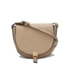 Meet our Adalyn Shoulder Bag, the chic shoulder bag that will be a style staple for seasons to come. Crafted from snake-embossed vegan leather matching high-quality smooth vegan leather, you will love this style to create a polished look. With a magnetic snap flap and a zipper closure, all your belongings will be safe. Unzips to reveal a fully lined interior with a slip pocket and a wall zippered pocket, generously sized to hold all your daily essentials. The exterior features a slip front pocke Chic Textured Leather Satchel Saddle Bag, Chic Textured Leather Saddle Bag With Top Handle, Chic Textured Leather Saddle Satchel Bag, Chic Textured Leather Saddle Shoulder Bag, Chic Crossbody Saddle Bag With Magnetic Closure, Chic Saddle Shoulder Bag With Magnetic Closure, Beige Shoulder Bag With Magnetic Closure, Textured Leather Rectangular Saddle Bag, Chic Beige Saddle Bag For Office