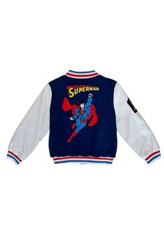 Description: Classic Superman™ Boys Bomber Jacket featuring a vibrant superhero print on the back. Contrasting sleeves with ribbed cuffs and hem for a sporty look. Front zip closure and side pockets for convenience. Ribbed collar adds an extra touch of style. Perfect for keeping warm while showcasing your favorite superhero. Material & Care: Fabric: High-quality polyester and cotton blend. Care Instructions: Machine wash cold with like colors. Tumble dry low. Do not bleach. Iron on low heat if n Classic Superman, Superman Boy, Grey Long Sleeve Shirt, Sparkle Dress, Blue Sweatshirt, Sporty Look, Romper With Skirt, Camo Print