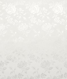 an image of a white wallpaper with flowers and leaves in the corner on it