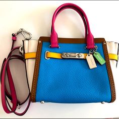 Brand New Beautiful Mini Bag,Tag With Price On Itall Metals Protected Well. Multicolor Top Handle Bag With Branded Hardware, Blue Top Handle Satchel With Silver-tone Hardware, Multicolor Rectangular Bag With Silver-tone Hardware, Travel Bags With Branded Hardware In Multicolor, Multicolor Travel Bags With Branded Hardware, Multicolor Shoulder Bag With Branded Hardware For Everyday Use, Designer Blue Satchel With Adjustable Strap, Multicolor Coach Top Handle Shoulder Bag, Multicolor Shoulder Bag With Branded Hardware