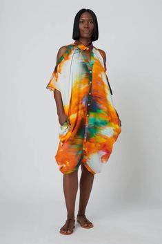 Ever dreamed of skydiving in a dress? Well, we've got the one for you. Leap into spring with the Scenic Cold shoulder dress from Hope for Flowers. It's a cocoon dress with built in shorts that will leave you feeling your best and looking your best! Orange Knee-length Mini Dress For Summer, Oversized Mini Dress For Summer, Summer Knee-length Bubble Dress, Multicolor Summer Dresses For Daywear, Knee-length Summer Bubble Dress, Oversized Short Sleeve Mini Dress For Summer, Casual Oversized Mini Dress For Summer, Multicolor Knee-length Summer Mini Dress, Oversized Orange Dresses For Spring