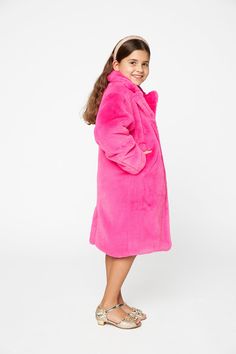 Fall nights can get a little chilly, so make sure to grab a fluffy coat to keep your mini me warm! She features three big button closure up the the front, two side pockets, and soft warm material! Throw her over any outfit to add a little warmth! Grab the Mommy & Me matching style: Zoey Hot Pink Pink Fluffy Winter Outerwear, Pink Fluffy Long Sleeve Fur Coat, Cozy Fluffy Long Sleeve Outerwear, Cozy Pink Outerwear With Pockets, Pink Fluffy Long Sleeve Outerwear, Plush-lined Fur Coat For Cold Weather, Winter Fur Coat With Plush Lining, Winter Fur Coat With Plush Lining And Long Sleeves, Long Sleeve Fur Coat With Plush Lining