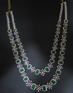 Gorgeous 18K Gold 2-in-1 Diamond 2 line Necklace with Green Color Stone 
   This is a 2-in-1 TWO line necklace. 
  The 2 lines can be detached and worn separately 
as one  medium length single line necklace or   as one short length single line necklace or 
  together as a two line necklace - 1-BG-DN-SET06145 - in 83.310 Grams for USD $15046.90. 
Made in India by Totaram Jewelers Online this product is in Gold - 18 Karat Gold  & is an excellent gift for Adult - Women. Ships fully insured with Single Line, Color Stone, Gifts For Adults, Medium Length, Green Color, Green Colors, Stone Color, 18k Gold, Ships