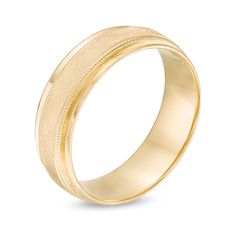 Stylish and masculine, this vintage-style wedding band appeals to his sophisticated taste. Fashioned in warm 10K gold, this 7.0mm-wide design features an intriguing textured center stripe bordered in intricate milgrain detailing and sleek grooves. Polished bevelled edges add further visual interest to the look. Buffed to a brilliant luster, this comfort-fit wedding band was designed with your love for him in mind. Due to its design, this ring cannot be resized after purchase. Classic Thick Band With Diamond Cut, Classic Jewelry With Diamond Cut And Thick Band, Timeless Formal Bands With Classic Design, Classic Engraved Ring With Thick Band For Anniversary, Classic Wide Band Anniversary Bands, Classic Wide Band For Anniversary, Classic Wide Band Wedding Bands, Timeless Yellow Gold Wide Band Wedding Ring, Timeless Wide Band Wedding Bands