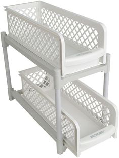 two white plastic baskets on top of each other in front of a white wall mounted shelf