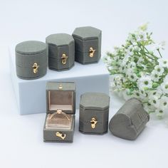 These ring boxes are Georgian styled and delicately crafted to ensure the utmost quality. The outside of the box features woven linen that is pleasing to the eye and feels luxurious. Inside, these boxes are lined with plush french velvet and satin. They feature a delicate golden clasp.  Specifications & Measurements: Material : Textured Linen exterior & Plush velvet interior lining. Shape : Hexagon, Oval, Square, Round Octagon, Square Octagon, Heart Exterior Color: Forest  Green Interior Color : Suede Ring Box, Wedding Presentation, Ring Box Proposal, Antique Style Jewelry, Proposal Ring Box, Vintage Jewellery Rings, Velvet Ring Box, Velvet Interiors, Proposal Engagement