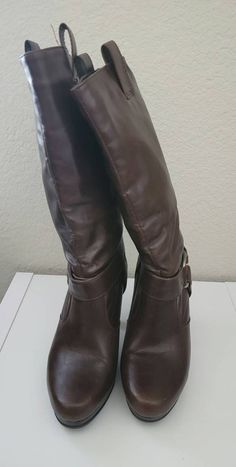 Size 7 1/2 midcalf boots. The heel measures 4". Vintage Faux Leather Boots For Fall, Vintage Winter Boots In Faux Leather, Vintage Faux Leather Winter Boots, Vintage Brown Faux Leather Boots, Retro Brown Faux Leather Boots, Wide Calf Vintage Mid-calf Boots, Vintage Wide Calf Mid-calf Boots For Fall, Brown Steampunk Boots With Round Toe, Steampunk Brown Boots With Round Toe