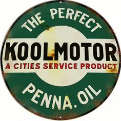 an old kool motor sign with the words penna oil in red and green