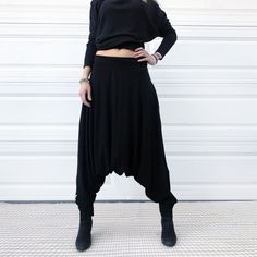 "Low-waist harem pants handmade from high quality cotton. Minimalist style. Black. This classy and elegant pair of harem pants is simply my everyday wear. Classic black color just goes well with everything. Whether I do my morning yoga routine or roam around the house running errands - this pant is just first thing i put on every morning. When the time comes to dress up and go out to dinner with friends in the city - again - this pair is my choice, i just style it with a fancy jacket or some asy Mens Kimono Shirt, Friends In The City, White Harem Pants, Ninja Pants, Samurai Pants, Morning Yoga Routine, Cotton Harem Pants, Black Harem Pants, Festival Jacket