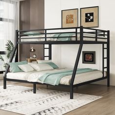 a black metal bunk bed sitting on top of a wooden floor