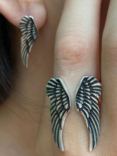 Angel wing ring Feather Ring sterling silver angel wing ring Silver Feather ring Antiqued silver ring Oxidized angel wing earrings The ring is adjustable, The two wings are not connected. However we offer sizes so that it fits perfectly Weight of the ring 9-10 gram depending on the size Feather Ring Silver, Wing Ring, Angel Wing Ring, Pomegranate Jewelry, Full Finger Rings, Healing Stones Jewelry, Silver Angel Wings, Antique Silver Rings, Angel Wing Earrings