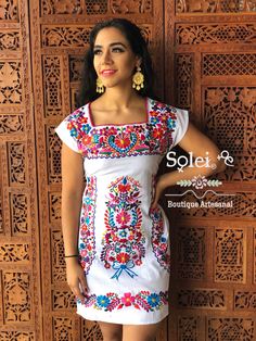 This Beautiful Mexican Colorful Floral Dress is the perfect dress for a fun night out or a special event. It is full of colorful embroidered flowers and has some crocheted details. This dress has ties on the back in order to adjust the fit. Please note: The accesories shown with this dress may purchased as well and Can be found in this links https://www.etsy.com/es/listing/637147293/filigrana-redonda-filigrana-clasica?ref=shop_home_active_1&pro=1&frs=1 https://www.etsy.com/es/listing/819 Multicolor Fitted Cotton Embroidered Dress, Fiesta Embroidered Cotton Dress With Multicolor Embroidery, Multicolor Embroidered Cotton Dress For Fiesta, Multicolor Floral Embroidered Short Sleeve Dress, Multicolor Embroidered Dress For Spring Fiesta, Fitted Multicolor Embroidered Floral Dress, Spring Multicolor Embroidered Dress With Neckline Detail, Fiesta Cotton Embroidered Dress With Short Sleeves, Multicolor Embroidered Dress For Fiesta