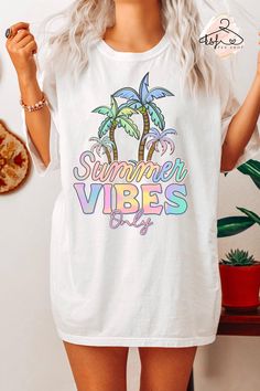 Summer Vibes Only Comfort Colors® T-shirt, Summer Vibes Shirt, Summer T-shirt, Palm Tree Shirt, Summertime T-shirt, Beach Shirt, Summer Gift Hello!! We wish everyone to smile with our cute, stylish, and trendy graphic T-shirts. We assure you these Comfort Colors® T-shirts are the perfect gifts whether you buy them for yourself or someone else. MATERIALS & FEATURES *6.1 oz., 100% ring spun cotton *Preshrunk, soft-washed, garment-dyed fabric *Twill taped shoulder-to-shoulder *Set-in sleeves *Double-needle stitched sleeves and bottom hem *1" ribbed collar with double-needle top stitched neckline HOW TO ORDER *Check the size chart and pick your size. *Check the color chart and pick your t-shirt color.  If you wish the trendy oversized look, please choose 2 size up from the normal size you pref Trendy Multicolor T-shirt For Beach Season, White Summer T-shirt With Text Print, Multicolor Letter Print T-shirt For Beach, White T-shirt With Letter Print For Vacation, Multicolor Text Print Summer Shirt, Multicolor Short Sleeve T-shirt For Beach, White Vacation Shirt With Text Print, Multicolor Crew Neck Summer T-shirt, White Short Sleeve T-shirt For Vacation