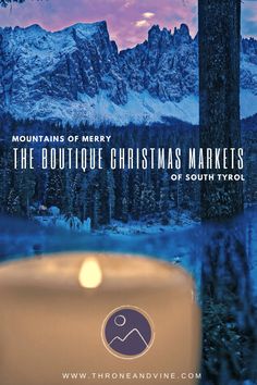 a candle is lit in front of a snowy mountain with the words, mountains of merry the boutique christmas markets of south africa