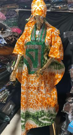 Kampala/Adire  Bubu, Ankara Bubu, African Kaftan, African Kaftan for Women, African print dress, Boubou Dress, Tye & Dye Bubu -  Handmade - Aso-Oke - Orange color  Senegalese boubou Kampala/Adire Long African women Bubu  Dress✨ One size  100% natural hand dyed  fabric: blend of cotton and polyester  Care instructions: Hand wash in cold water- do not BLEACH  no return no exchange no refund  Kindly allow a difference of the picture/pattern of your item(s) between the real-life image and the photog Green Kaftan With Traditional Patterns, Batik Print Dress For Festivals, Traditional Green Batik Print Kaftan, Batik Print Festival Dress, Traditional Green Kaftan With Batik Print, Festival Batik Print Dress, Festival Dresses With Batik Print, Green Batik Print Kaftan, Traditional Multicolor Ankara Kaftan