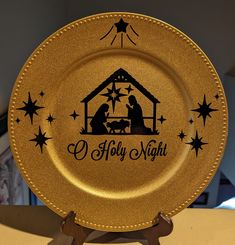 12 x 12 gold acrylic plate with a fine glitter finish and beaded border.  Image and writing is  black vinyl This elegant looking plate will add to any Christmas decor.  Makes a great gift! Plate is decorative only not to be used with food Christmas Plate, Christmas Jesus, Christmas Nativity Scene, O Holy Night, Religious Christmas, Christmas Plates, Christmas Nativity, Holy Night, Christmas 2023