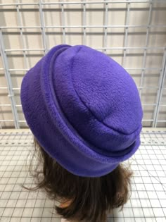 I made this warm pillbox style hat out of purple plum fleece for warmth and comfort. The stand and top are a double layer of fleece. It's sized to fit most adults 21.5-23 inches around head. It has a nice stretchy feel and is completely machine washable and dryable. Fleece Hat Pattern, Fleece Sewing Projects, Fleece Projects, Winter Fur Hat, Sewing Hats, Purple Fleece, Fleece Hats, Girls Fur, Sewing Fleece