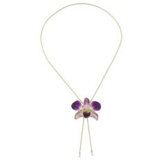 Resplendent in jewelry a natural dendrobium orchid is forever preserved in resin to share its beauty. Danai accentuates the Thai blossom with 22k gold and displays the pendant on a slender brass chain bathed in gold. Because natural blossoms are used size and shape will vary slightly. Elegant Pressed Flowers Jewelry With Flower Pendant, Elegant Pressed Flower Pendant Jewelry, Elegant Flower Pendant Jewelry With Pressed Flowers, Elegant Pressed Flower Jewelry, Elegant Jewelry With Pressed Flowers, Elegant Orchid Flower Jewelry, Orchid Flower Pendant Jewelry Gift, Orchid Flower Pendant Jewelry For Gift, Elegant Pressed Flower Pendant Necklace