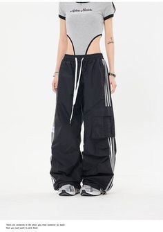 Vintage Side Striped Baggy Cargo Sweatpants | fairypeony Baggy 90s Black Bottoms, 90s Style Baggy Black Bottoms, 90s Style Black Baggy Bottoms, 90s Style Black Summer Pants, Black 90s Style Summer Pants, Y2k Black Bottoms With Side Pockets, Black Y2k Bottoms With Side Pockets, Striped Pants With Pockets For Streetwear, Striped Bottoms With Pockets For Streetwear