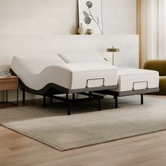 a modern daybed with two pull out mattresses in the middle of a living room