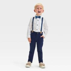 Dress your toddler for a school function or any special occasion with the Long-Sleeve Button-Down Shirt and Suspender Pants Set from Cat & Jack™. This outfit set includes a button-down shirt, pants and suspenders to get them ready for any occasion in classic style. Plus, the suspenders have an adjustable elastic strap with a snap closure to customize the fit. The lightweight poplin fabric keeps them in cool comfort, and the pull-on style ensures ease of wear. Cat & Jack™: Designed for all childr Toddler Suspender Outfit, Blue Wedding Guest Outfits, Toddler Suspenders, School Function, Suspenders Set, Suspender Pants, French Terry Shorts, Navy Blue Wedding, Top And Pants Set