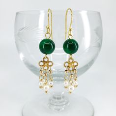 "Just as every luminous pearl begins as a grain of sand, we begin as flawed beings and improve ourselves daily. These \"Seeds of Heaven\" earrings are both glamorous and understated, perfect to accompany you wherever your personal journey leads. ⚜Item Specifics ❀ Gold Plated Sterling Silver Ear Wire ❀ Gold Plated Sterling Silver Clover Flower ❀ Natural Jade (8mm) ❀ Fresh Water Pearl (6mm) ❀ Total length is approximately 1.75 inches ⚜No Risk Guarantee ❀ If you are unhappy with your jewelry, you w Elegant Latkan Earrings With Round Beads, Elegant Latkans Earrings, Elegant Green Jade Beaded Earrings, Handmade Green Chandelier Earrings For Celebration, Elegant Nickel-free Chandelier Earrings With Round Beads, Elegant Green Pearl Earrings For Celebration, Elegant Jade Beaded Round Earrings, Elegant Jade Beaded Earrings With Round Beads, Jade Earrings With Dangling Beads As A Gift