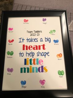 a framed poster with the words it takes a big heart to help shape little minds