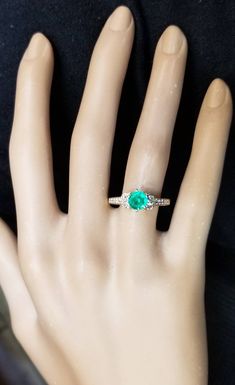 Gorgeous 18k Yellow gold ring natural green Emerald, Center round shape weight 0.92ct. size 5.9m very nice rich medium green color nice luster lively,brilliant stone and clean. side diamonds total weight 0.50ct. SI1-G ring size 7.5 Resizable Retail value $6,500 net . Appraisal available Gia Certified Oval Green Diamond Ring, Green Oval Diamond Ring With Vvs Clarity, Fine Jewelry Green Diamond Ring For May Birthstone, Green Diamond Ring Fine Jewelry, Fine Jewelry Green Diamond Promise Ring, Classic Green Diamond Round Ring, Fine Jewelry Green Moissanite Emerald Ring, Classic Round Green Diamond Ring, Fine Jewelry Emerald Moissanite Ring