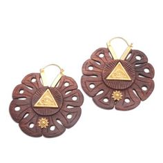 The Eye of Providence or the all-seeing eye of God is featured in these unique earrings from Kuera Putra in Bali. The hoop earrings are hand carved from tamarind wood and accented with 18k gold plated brass. The Eye of Providence is especially recognizable to Americans as it is on the reverse side of the Great Seal of the United States--and on the one-dollar bill. Symbolic Carved Brown Jewelry, Brown Engraved Jewelry For Festivals, Brown Engraved Jewelry For Festival, Engraved Brown Jewelry For Festival, The Eye Of Providence, Eye Of God, Wood Hoop Earrings, One Dollar Bill, Eye Of Providence