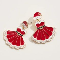 Get in the holiday spirit with our Santa Girl Drop Earrings! These festive red earrings are the perfect accessory to complete your Christmas look. Spread joy and cheer with these holiday-inspired drop earrings. Add them to your jewelry collection today! 1 1/4" Drop, 1 1/2" Width Santa Girl, Christmas Look, Ole Miss Rebels, Boutique Trends, Holiday Earrings, University Of South Carolina, University Of Oklahoma, University Of Arkansas, Holiday Earring