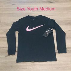 Nwt- Nike Long Sleeve Tee ~Size Medium (Youth) ~Standard Fit ~Smoke/Pet Free Home Nike Long Sleeve T-shirt For Spring, Nike Long Sleeve Tops With Letter Print, Nike Black T-shirt For Spring, Nike Graphic Print Tops For Winter, Nike Winter Graphic Print Tops, Nike Graphic Print Winter Tops, Nike Winter Tops With Graphic Print, Nike Fitted Winter Tops, Fitted Nike Tops For Winter