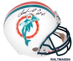 a signed miami dolphins football helmet with the dolphins logo on it and an inscription that reads,