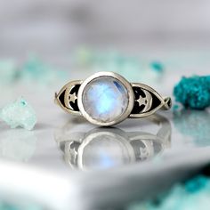 magical star and moon ring with a shimmering moonstone gem as the centerpiece. The intricate details of the design combined with the radiant moonstone make this ring a truly mesmerizing piece of jewelry. Ideal for anyone who loves celestial-inspired accessories.  Made of sterling silver. This ring features a natural, genuine, unique Moonstone gemstone handpicked from our current collection. The actual gemstone you receive will be one-of-a-kind and may be different from the photos, making your ri Silver Rings For Women, Moonstone Ring Sterling Silver, Star And Moon, Moon Ring, Stars Moon, Celestial Jewelry, Ring Boho, Cute Rings, Boho Ring