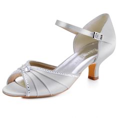 a pair of women's silver shoes with straps and heels on the heel,